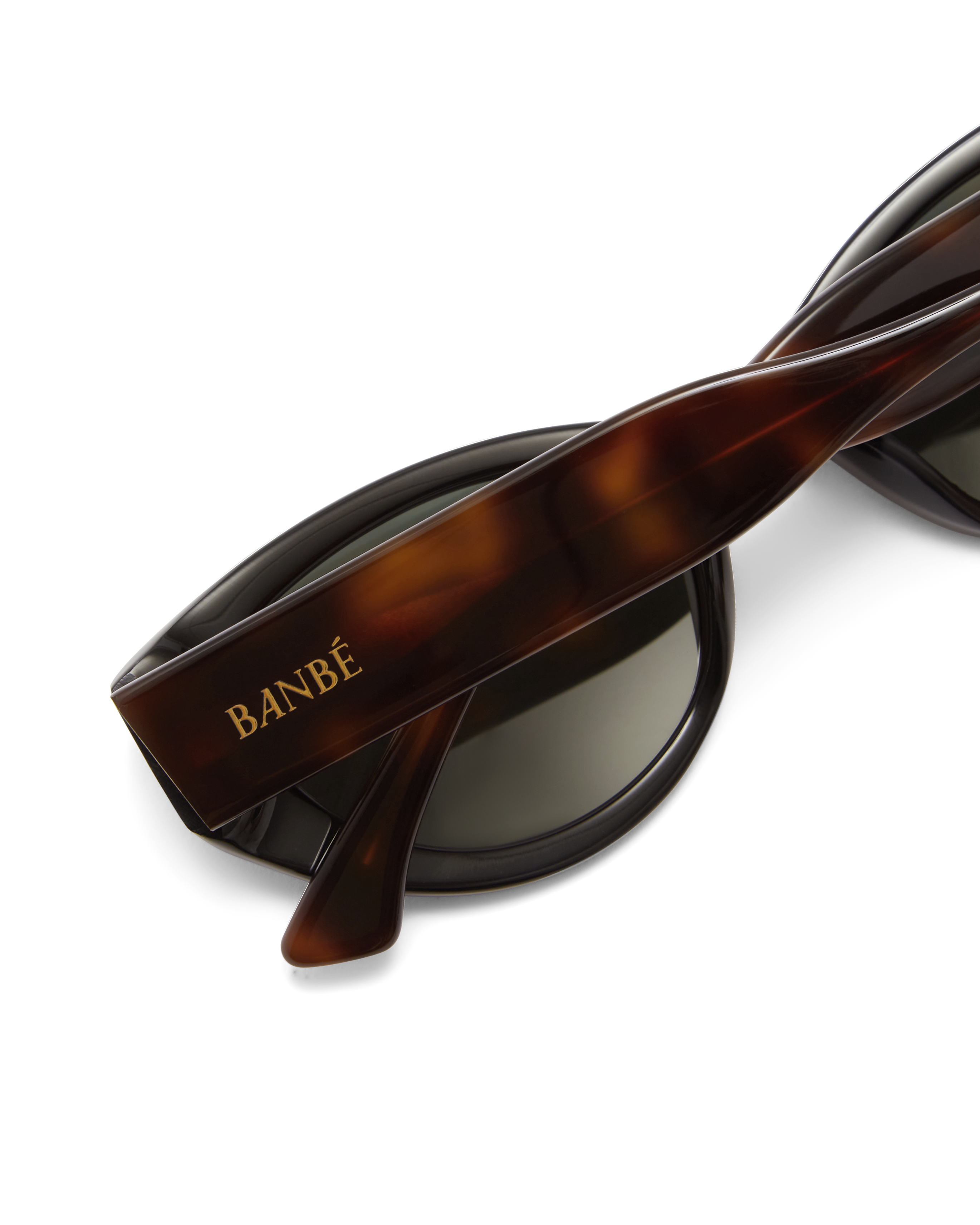 Women’s tortoiseshell cat-eye sunglasses with chunky acetate frame, tinted lenses